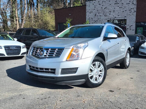 2014 Cadillac SRX for sale at Atlanta Unique Auto Sales in Norcross GA