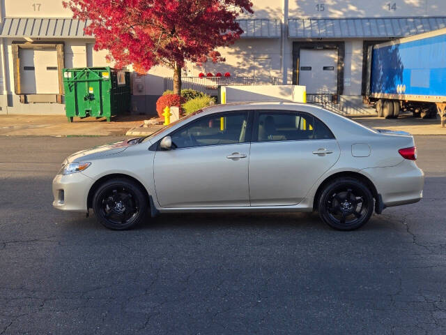 2013 Toyota Corolla for sale at Alpha Auto Sales in Auburn, WA