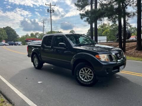 2014 Nissan Frontier for sale at THE AUTO FINDERS in Durham NC