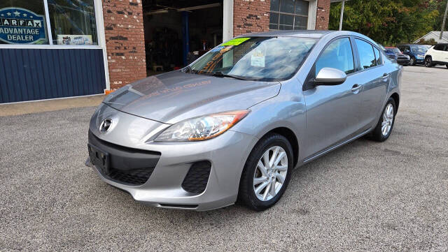 2012 Mazda Mazda3 for sale at North Ridge Auto Center LLC in Madison, OH