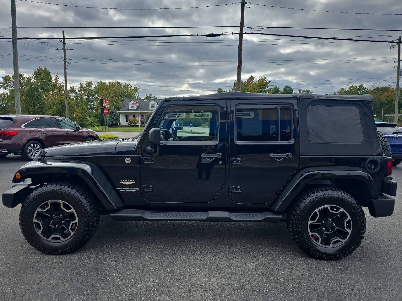 2014 Jeep Wrangler Unlimited for sale at GLOBE AUTO SALES in Louisville, KY