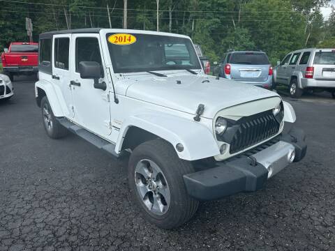 2014 Jeep Wrangler Unlimited for sale at Pine Grove Auto Sales LLC in Russell PA