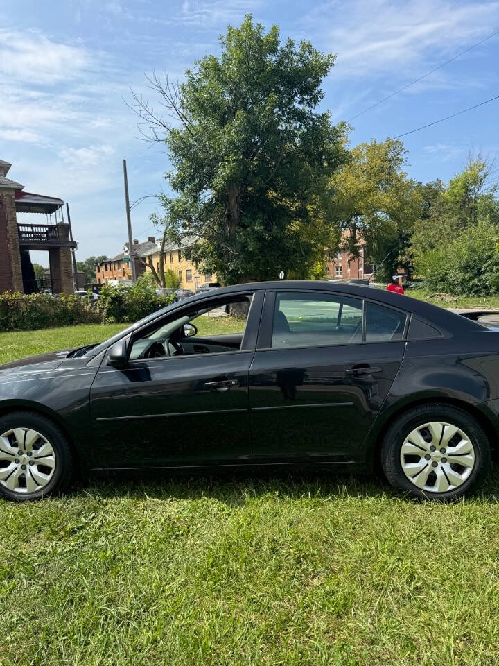 2015 Chevrolet Cruze for sale at H & H AUTO GROUP in Detroit, MI