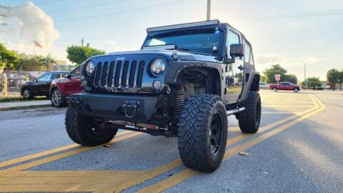 2009 Jeep Wrangler for sale at Maxicars Auto Sales in West Park FL