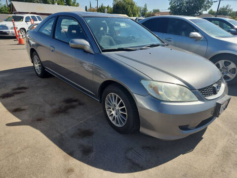 2005 Honda Civic for sale at COMMUNITY AUTO in Fresno CA