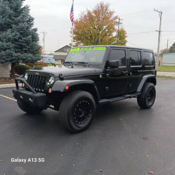 2014 Jeep Wrangler Unlimited for sale at Ideal Auto Sales, Inc. in Waukesha WI