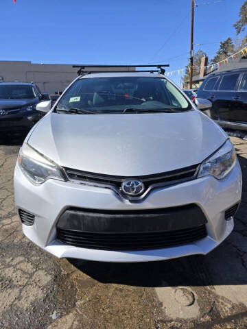 2015 Toyota Corolla for sale at Queen Auto Sales in Denver CO