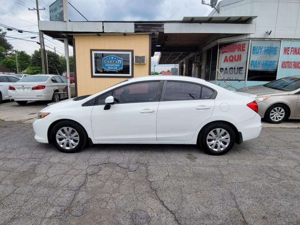 2012 Honda Civic for sale at DAGO'S AUTO SALES LLC in Dalton, GA