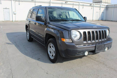 2015 Jeep Patriot for sale at ROADSTERS AUTO in Houston TX