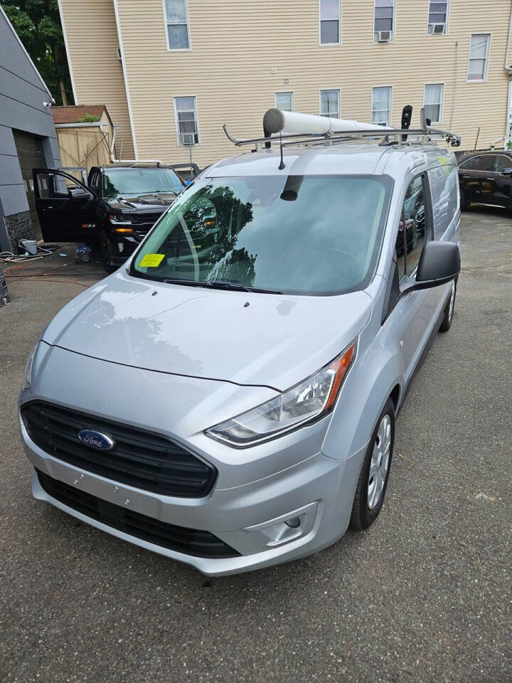 2019 Ford Transit Connect for sale at RENOS AUTO SALES LLC in Waterbury, CT