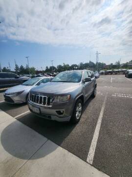 2012 Jeep Grand Cherokee for sale at PHIL SMITH AUTOMOTIVE GROUP - Pinehurst Toyota Hyundai in Southern Pines NC