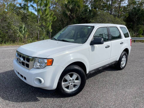 2010 Ford Escape for sale at VICTORY LANE AUTO SALES in Port Richey FL