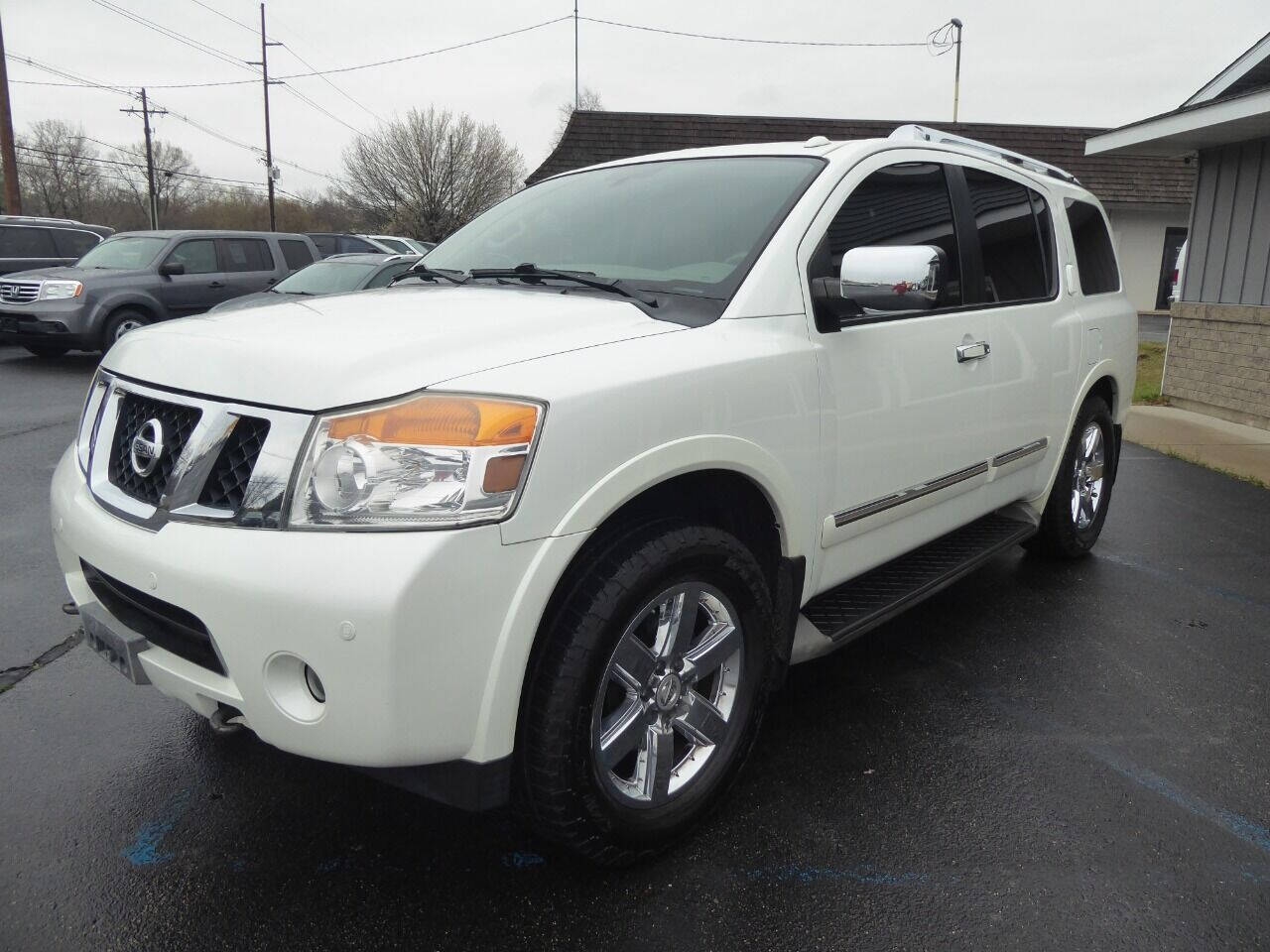 2013 Nissan Armada for sale at Lakeshore Autos in Holland, MI