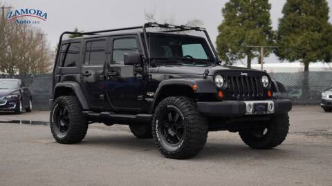 2013 Jeep Wrangler Unlimited for sale at ZAMORA AUTO LLC in Salem OR