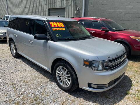 2014 Ford Flex for sale at CHEAPIE AUTO SALES INC in Metairie LA