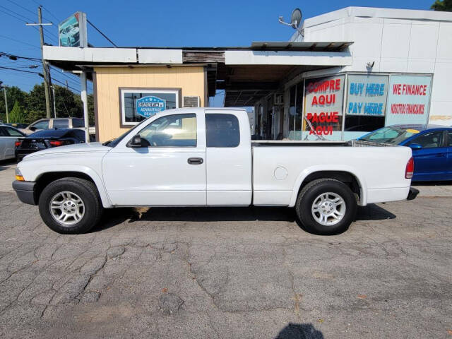 2004 Dodge Dakota for sale at DAGO'S AUTO SALES LLC in Dalton, GA