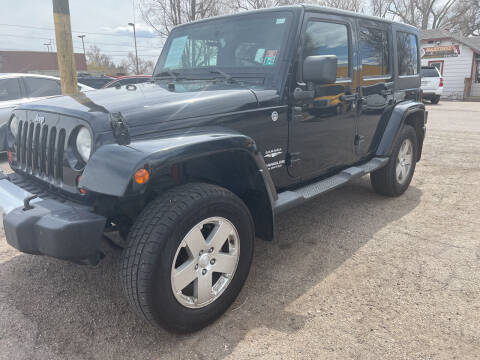 2011 Jeep Wrangler Unlimited for sale at Martinez Cars, Inc. in Lakewood CO
