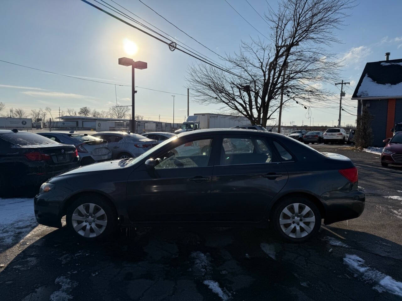 2009 Subaru Impreza for sale at AVS AUTO GROUP LLC in CLEVELAND, OH