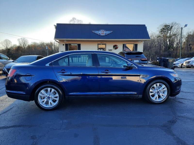 2011 Ford Taurus for sale at G AND J MOTORS in Elkin NC