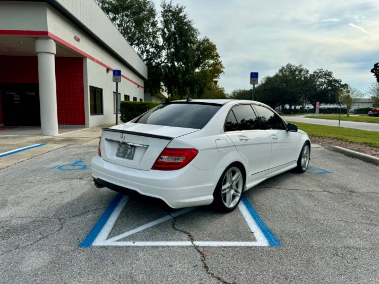 2013 Mercedes-Benz C-Class for sale at Zoom Auto Exchange LLC in Orlando, FL