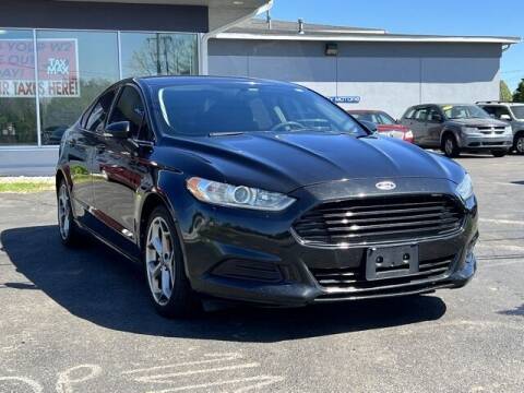2013 Ford Fusion for sale at Mighty Motors in Adrian MI