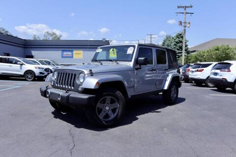 2015 Jeep Wrangler Unlimited for sale at BIG JAY'S AUTO SALES in Shelby Township MI
