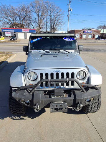 2012 Jeep Wrangler Unlimited for sale at AmericAuto in Des Moines IA