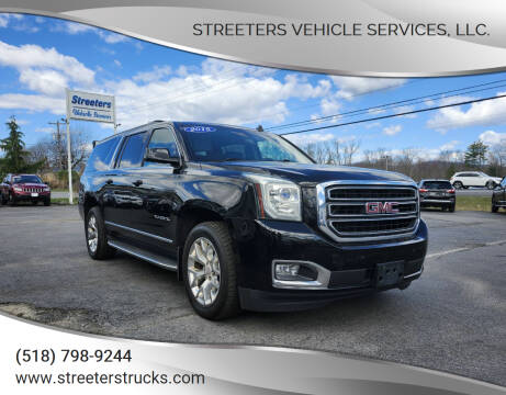 2015 GMC Yukon XL for sale at Streeters Vehicle Services,  LLC. in Queensbury NY