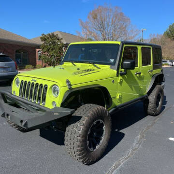 2016 Jeep Wrangler Unlimited for sale at Auto Palace Inc in Columbus OH