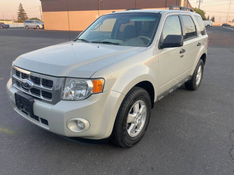 2009 Ford Escape for sale at Lux Global Auto Sales in Sacramento CA