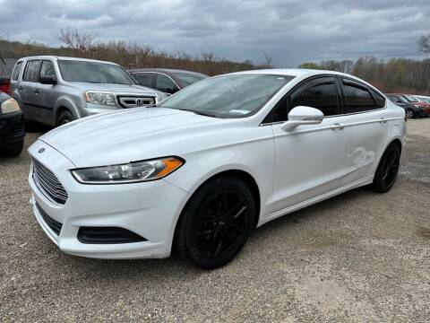 2016 Ford Fusion for sale at TIM'S AUTO SOURCING LIMITED in Tallmadge OH