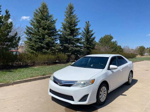 2012 Toyota Camry for sale at QUEST MOTORS in Englewood CO