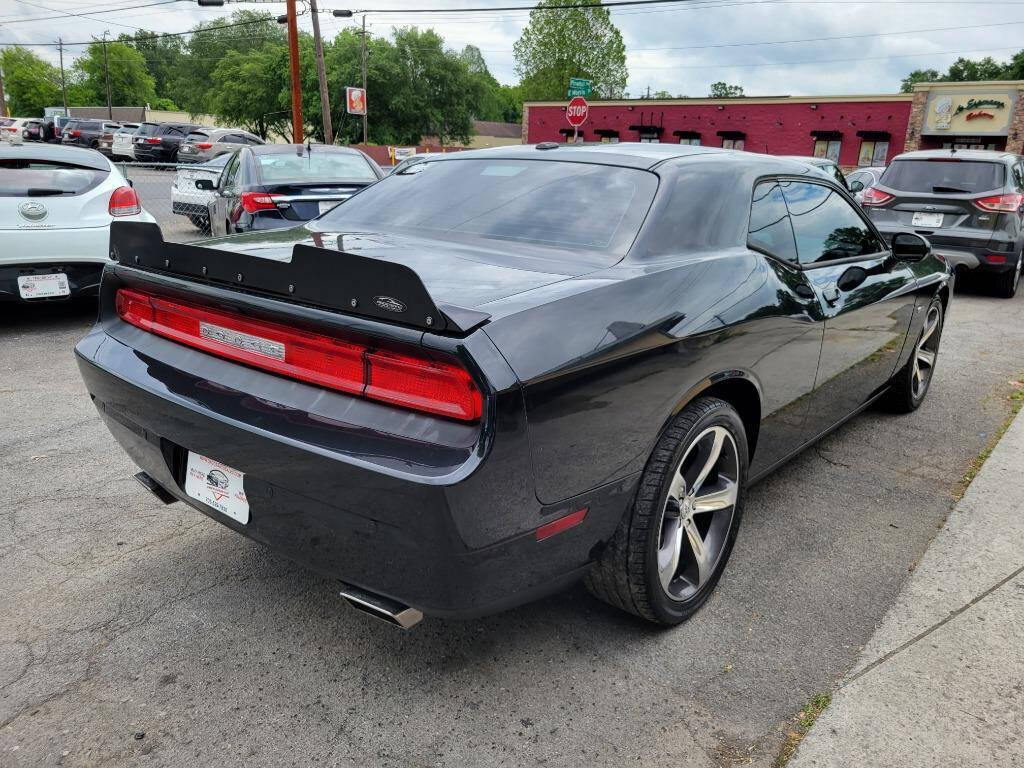 2014 Dodge Challenger for sale at DAGO'S AUTO SALES LLC in Dalton, GA