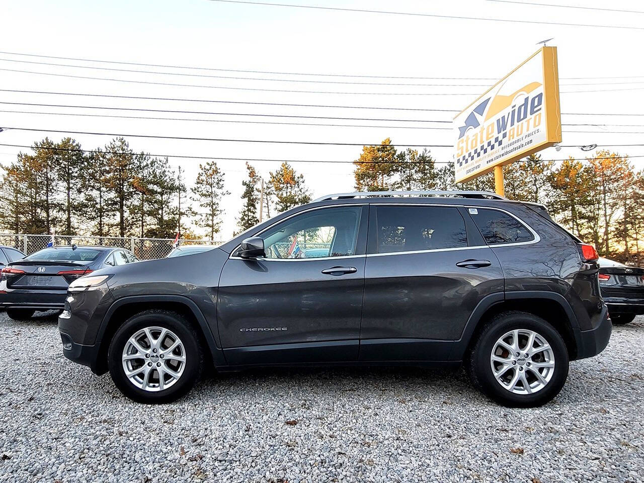 2015 Jeep Cherokee for sale at Statewide Auto LLC in Akron, OH