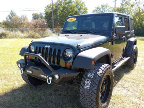 2012 Jeep Wrangler Unlimited for sale at LA PULGA DE AUTOS in Dallas TX