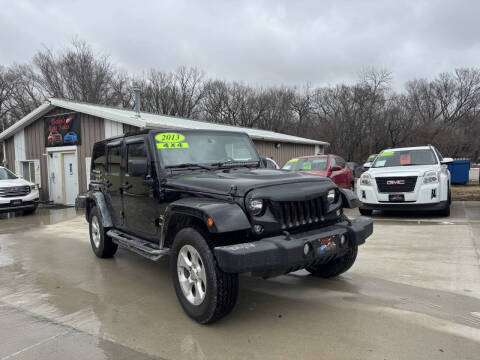 2013 Jeep Wrangler Unlimited for sale at Victor's Auto Sales Inc. in Indianola IA