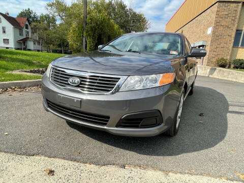 2009 Kia Optima for sale at Goodfellas Auto Sales LLC in Clifton NJ