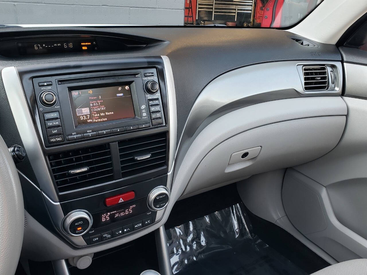 2011 Subaru Forester for sale at Auto Shop in Wyoming, MI