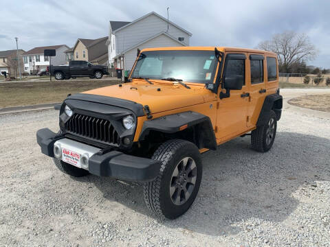 2012 Jeep Wrangler Unlimited for sale at A & R AUTO SALES in Lincoln NE