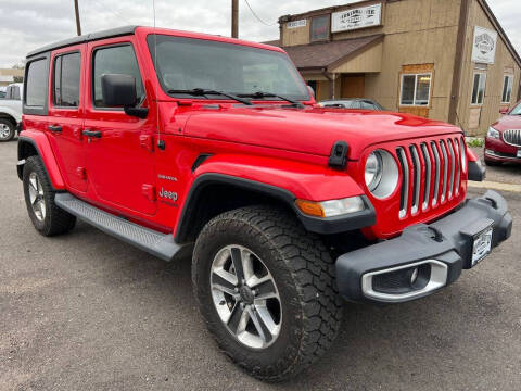2019 Jeep Wrangler Unlimited for sale at BERKENKOTTER MOTORS in Brighton CO