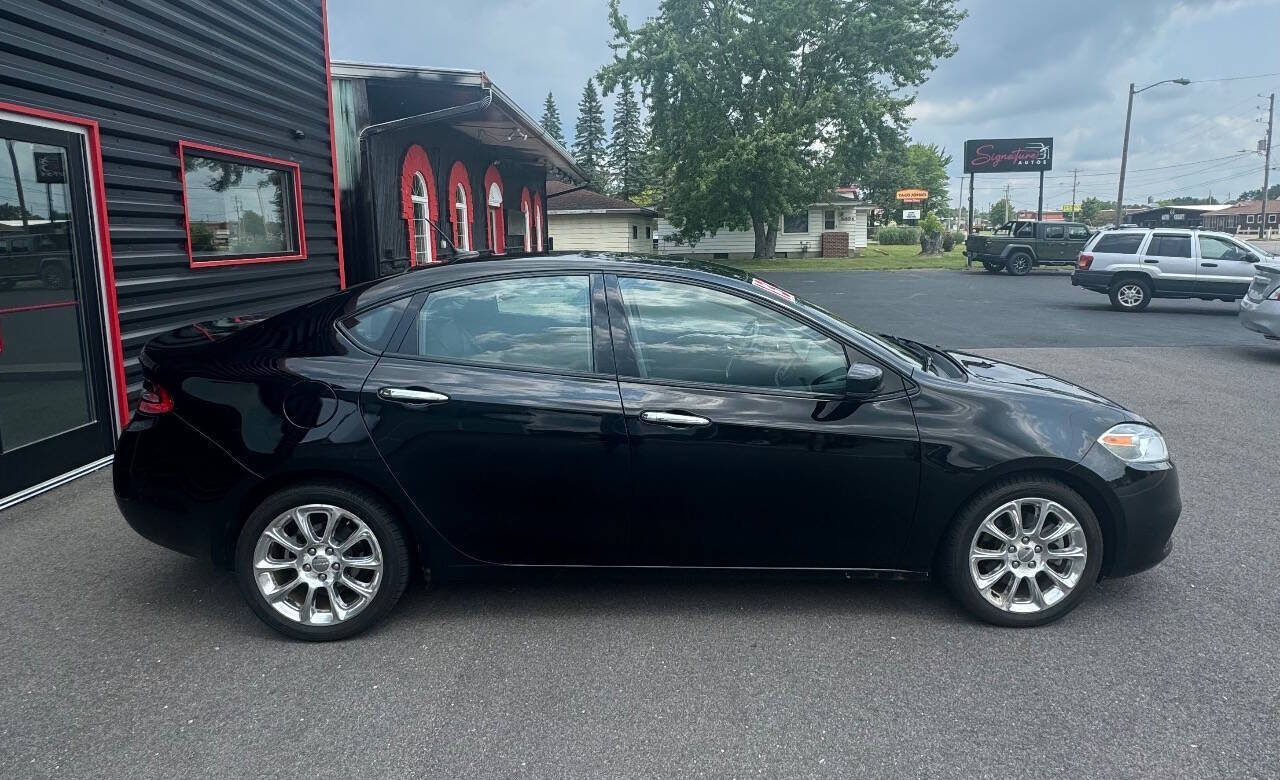 2013 Dodge Dart for sale at SIGNATURE AUTOS LLC in Weston, WI