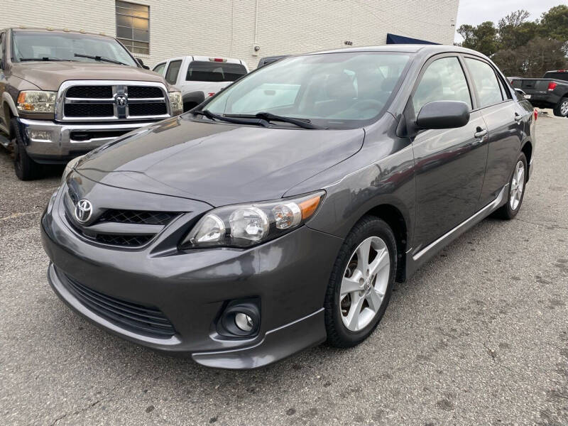 2011 Toyota Corolla for sale at Delta Auto Sales in Marietta GA