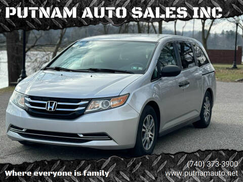 2014 Honda Odyssey for sale at PUTNAM AUTO SALES INC in Marietta OH