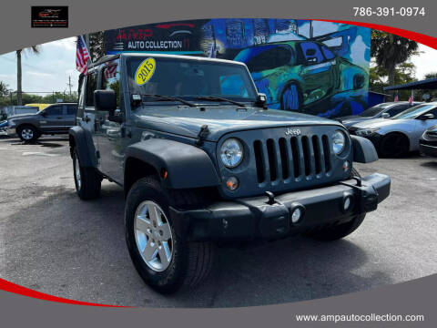 2015 Jeep Wrangler Unlimited for sale at Amp Auto Collection in Fort Lauderdale FL