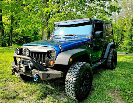 2009 Jeep Wrangler for sale at GOLDEN RULE AUTO in Newark OH