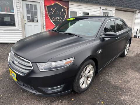 2013 Ford Taurus for sale at J & E AUTOMALL in Pelham NH