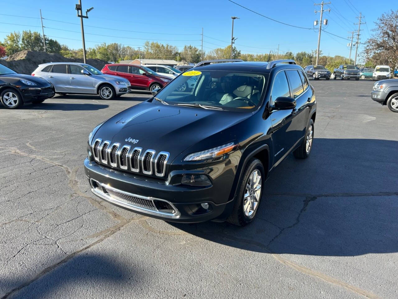 2014 Jeep Cherokee for sale at Wyrick Auto Sales & Leasing Inc in Zeeland, MI