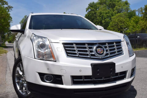 2014 Cadillac SRX for sale at QUEST AUTO GROUP LLC in Redford MI