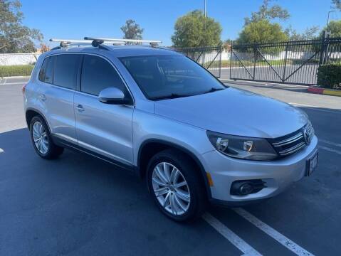 2013 Volkswagen Tiguan for sale at E and M Auto Sales in Bloomington CA