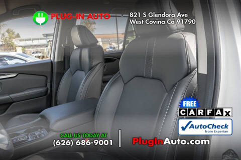 2023 Honda Pilot EX-L w/Rear Captain's Chairs